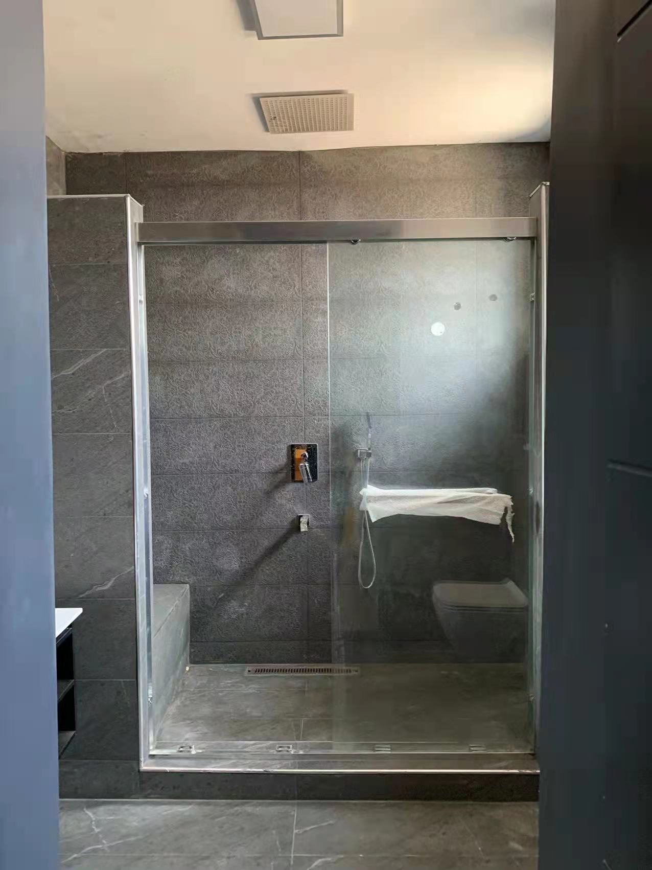 Shower Enclosure with Grey Tile Walls